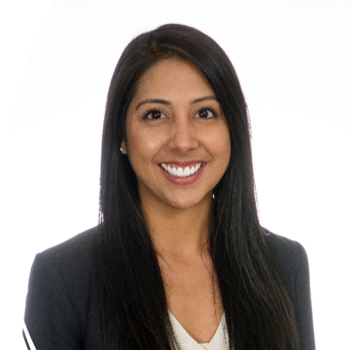 Professional headshot of a smiling woman with long, straight dark hair, wearing a black blazer over a light-colored blouse. She stands against a plain white background.